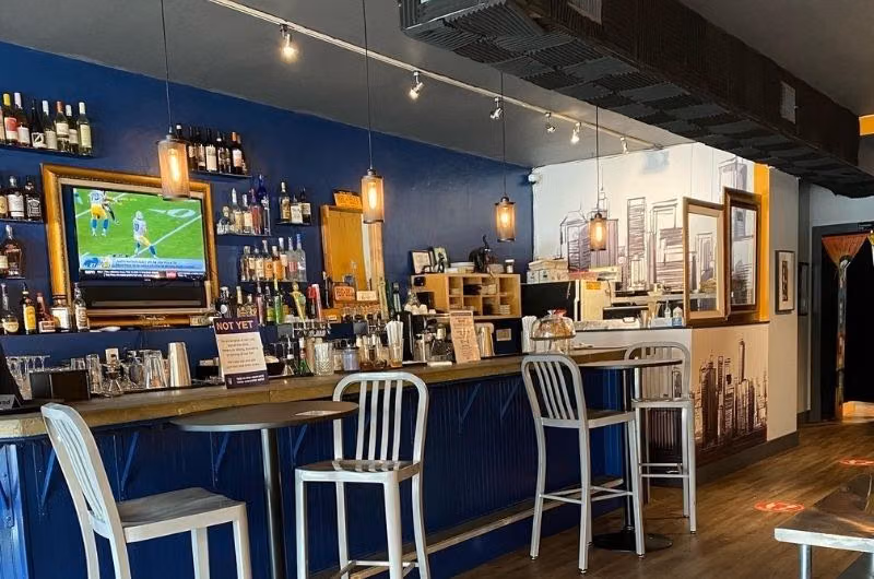 Bar counter and stools inside Apt 9F in Wilton Manors.
