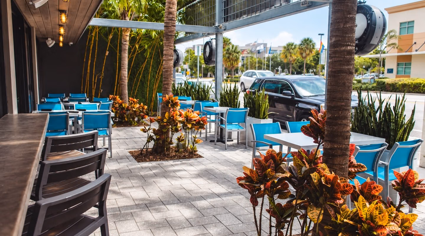 AI recreation of the outdoor patio at ethos Greek Bistro on Wilton Drive.
