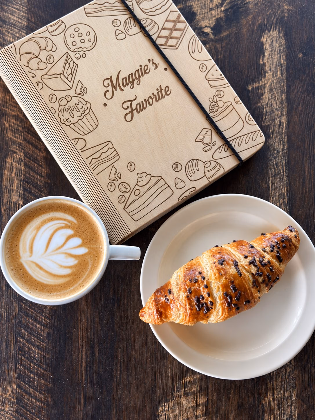 AI recreation of coffee and a croissant at Maggie’s Favorite.