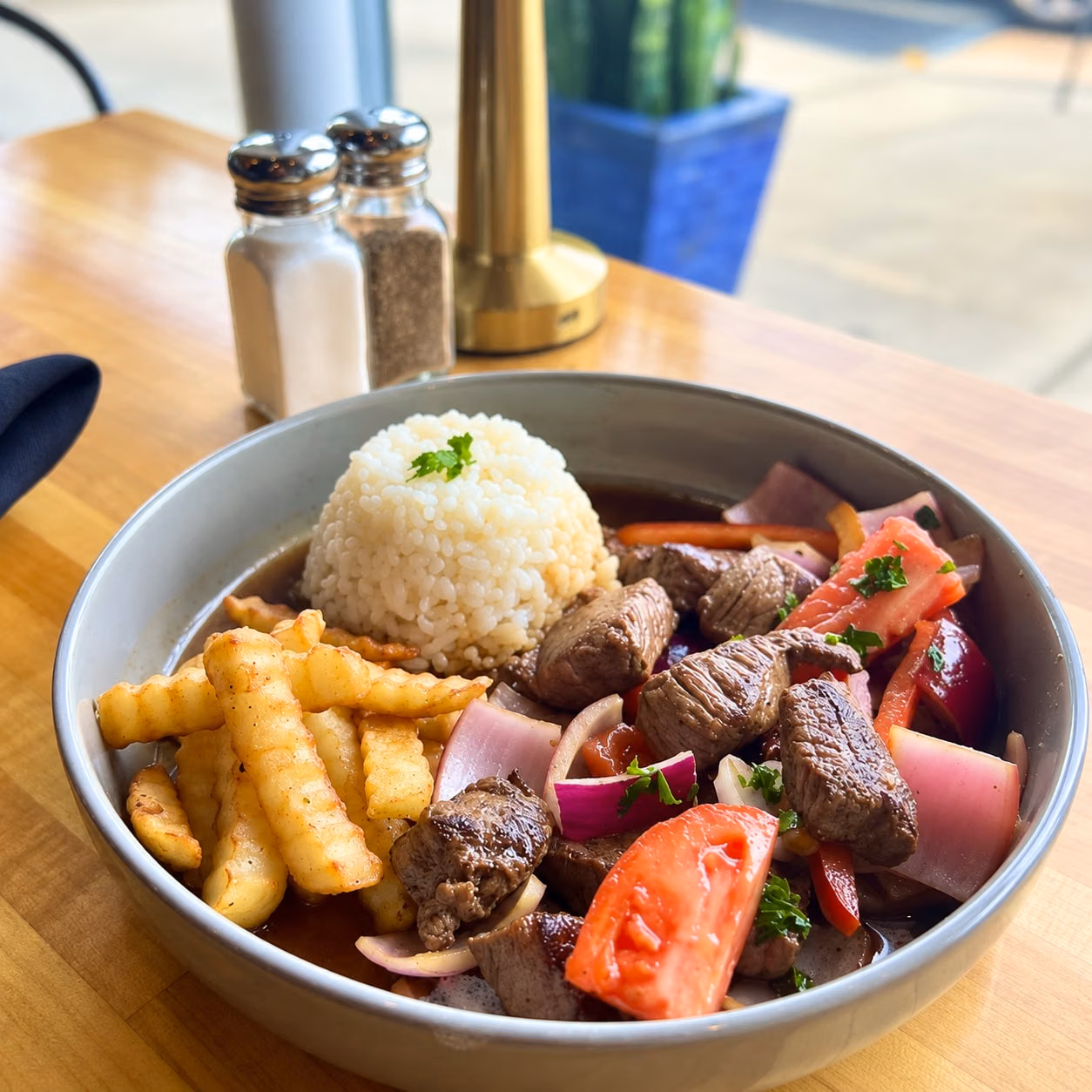 AI recreation of lomo saltado at Sardi Peruvian Cuisine.