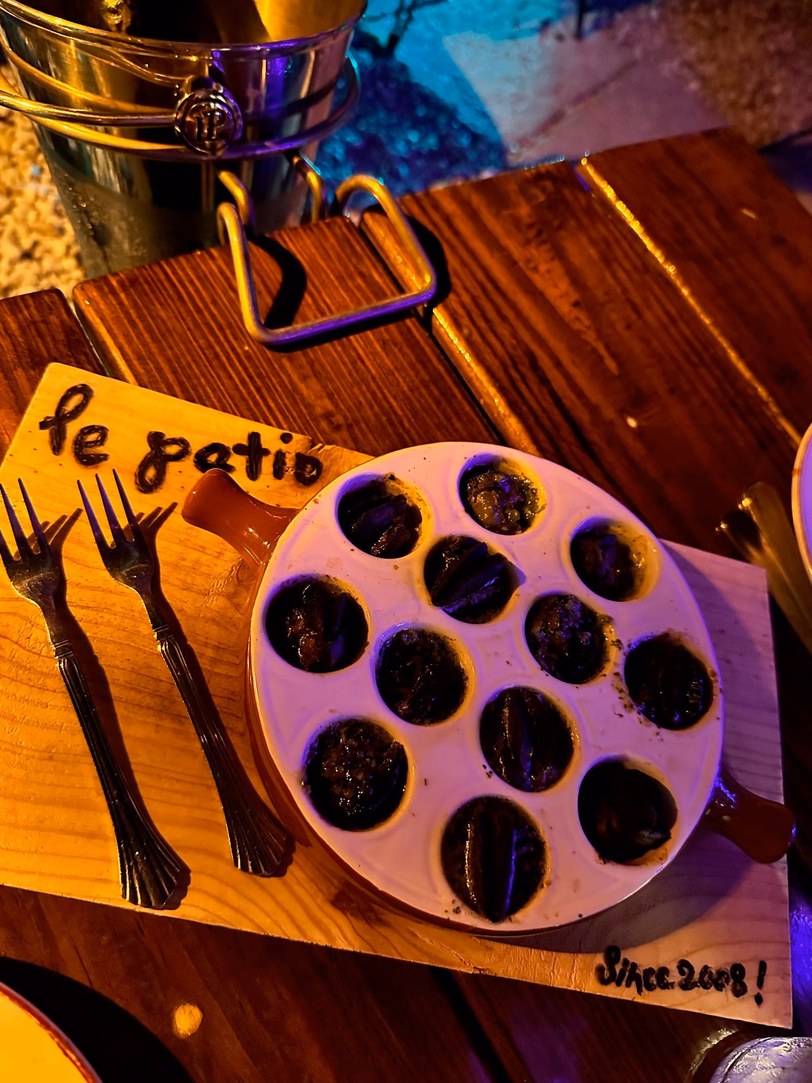 Escargot at Le Patio, photographed in February 2023.