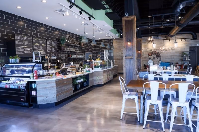 Coffee counter and tables at Press and Grind